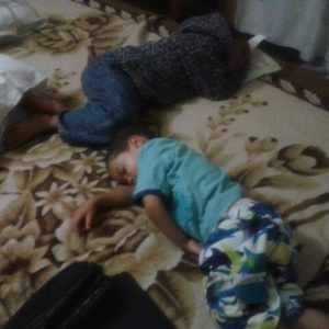 boys sleeping on the floor by rob rooker